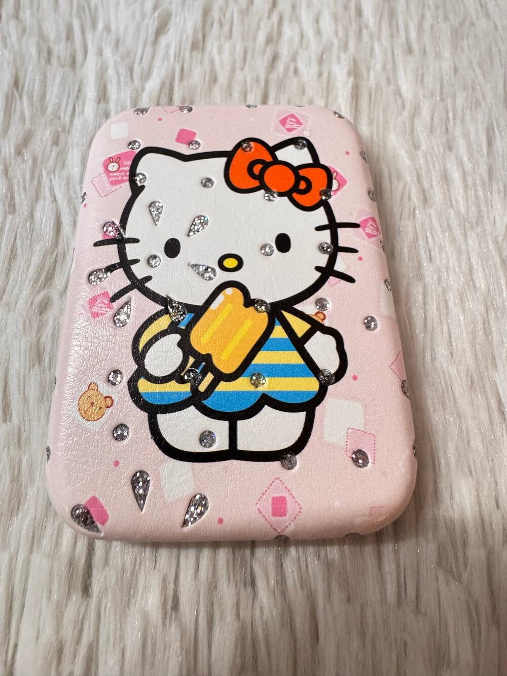 Hello Kitty compact mirror doble side  with Hello Kitty holding a popsicle